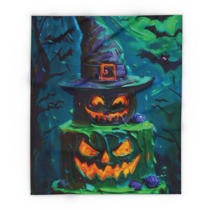 Decorative and Warm Halloween Spooky Arctic Fleece Blanket featuring a vibrant design of three carved pumpkins with glowing faces and a witch's hat, ideal for festive seasonal comfort.