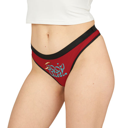Elegant model showcasing the red 'Good Girl' thong panties, highlighting their flattering cut and subtle graphic design, ideal for embracing feminine allure.