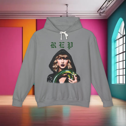 Elegant unisex cotton hoodie for Swifties in a soft grey hue, designed with a striking image of Taylor Swift, ideal for fashionable fans.