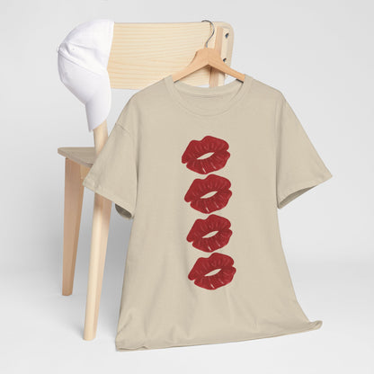 Chic t-shirt draped over a wooden chair, showcasing a bold design of four deep red lips against a neutral beige fabric, exuding romance and style.