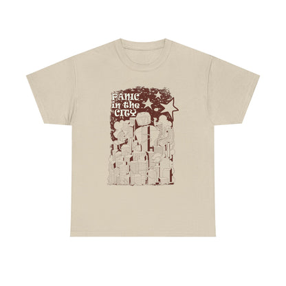 Elegant beige men's tee displaying an intricate cityscape illustration with a quirky robot design, highlighted by the bold text 'PANIC IN the CITY' in contrasting brown hues.
