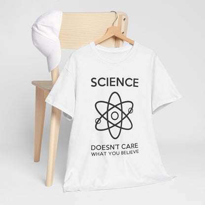 Stylish unisex white t-shirt featuring a bold 'SCIENCE' graphic and an atom design, displayed elegantly on a wooden chair with a cap, perfect for casual and intellectual individuals.