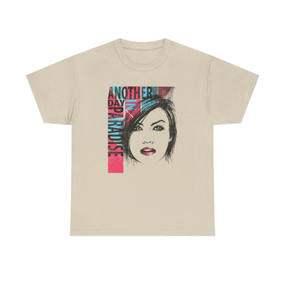 Elegant beige t-shirt adorned with an artistic graphic portrait of a woman, showcasing her alluring features and the colorful phrase 'ANOTHER DAY IN PARADISE' in a modern design.