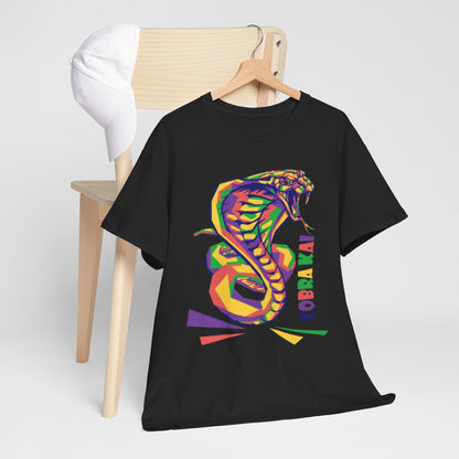 Chic display of a Cobra Kai T-shirt on a hanger, accompanied by a stylish cap, highlighting the vibrant snake design suitable for any casual gathering.