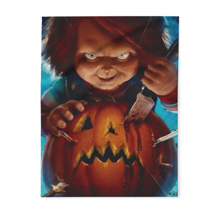 Decorative and Warm Halloween Chucky Spooky Arctic Fleece Blanket featuring a chilling design of a mischievous doll carving a jack-o'-lantern, ideal for adding a touch of spooky elegance to your decor this Halloween season.