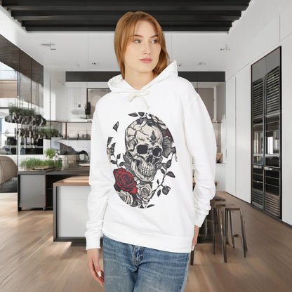 Model wearing a white Unisex Lightweight Hooded Sweatshirt with a unique designer skull and roses print, set in a modern kitchen.