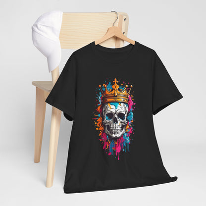 Chic men's T-shirt draped over a wooden chair, highlighting a bold stylized skull with a golden crown, set against an artistic backdrop of vibrant blue, pink, and orange hues.