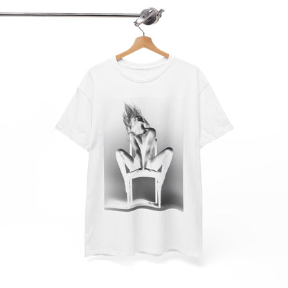 Luxurious unisex graphic t-shirt featuring a striking black and white design of a woman's silhouette, elegantly posed on a chair. The soft cotton fabric offers both style and comfort, perfect for making a statement.