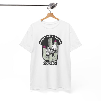 Elegant white t-shirt showcasing a distinctive ‘DON'T BE A PRICK’ graphic design featuring a pale olive-green cactus intertwined with a detailed skull, perfect for bold fashion statements.