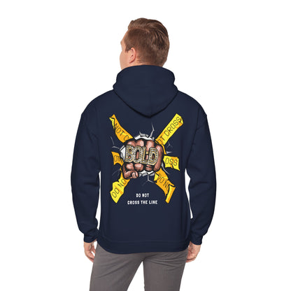Stylish navy hoodie modelled with a striking back print of a fist graphic, merging luxury aesthetics with urban flair.