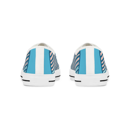 Close-up view of Zara Boltstrike Men's Lowtop Sneakers by Dazzling Dreams Studio showcasing superior comfort and quality craftsmanship with a chic blue and pastel pink design.