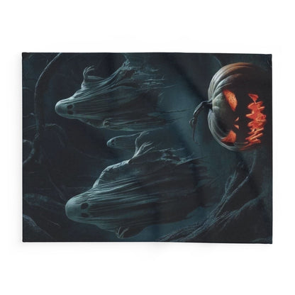 Elegant Decorative and Warm Halloween Spooky Arctic Fleece Blanket adorned with spectral figures and a glowing pumpkin, enhancing your Halloween charm.