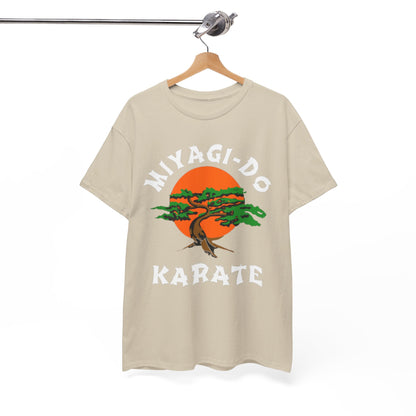 Chic beige t-shirt adorned with the Miyagi-Do Karate emblem, beautifully displayed on a hanger, capturing the essence of martial arts style.