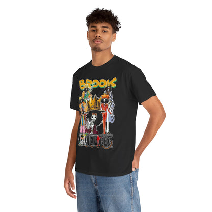 Male model showcases a luxury black anime t-shirt adorned with a colourful Brook character collage from 'One Piece', perfect for making a bold fashion statement.