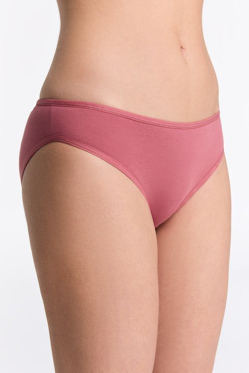 Close-up of the gentle texture of organic cotton fabric, highlighting the luxurious feel of women's classic briefs by Earth Wardrobe.