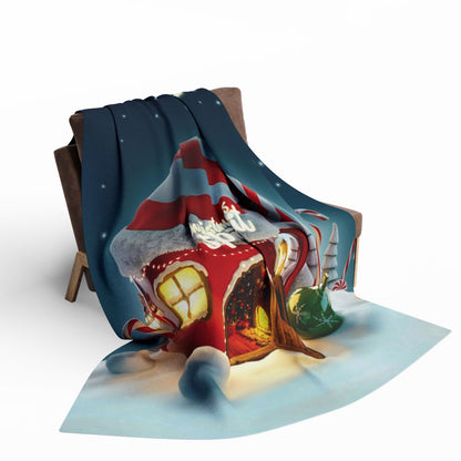 Luxurious Decorative and Warm Christmas Arctic Fleece Blanket draped over a stylish armchair, featuring a vibrant winter-themed design with a festive gingerbread house and surrounding decorations, perfect for enhancing your holiday decor.