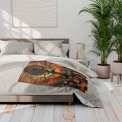 Elegant Halloween Spooky Arctic Fleece Blanket on a bed, capturing a mystical scene with sinister pumpkins and a ghostly tree, perfect for enhancing your Halloween decor.