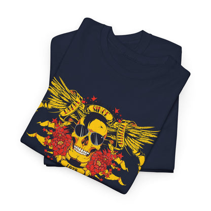 Folded navy graphic t-shirts featuring a bold yellow skull design with wings, flowers, and stars, embodying a unique and edgy aesthetic.