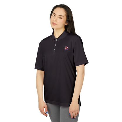 Model wearing the Adidas Unisex Performance Polo Shirt in dark navy, highlighting its luxurious fit and stylish design, made from sustainable 100% recycled polyester.