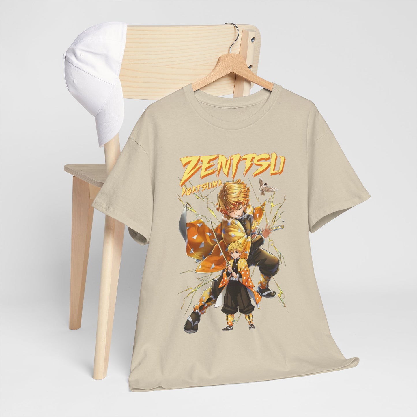 Chic Zenitsu Agatsuma t-shirt styled on a wooden chair with a white cap, highlighting a trendy outfit ideal for casual outings.