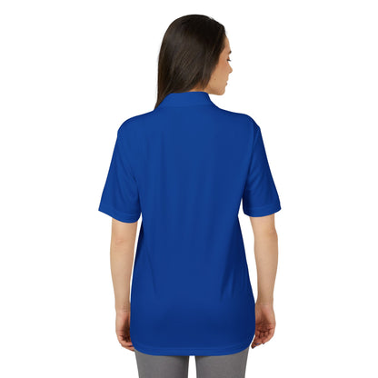 Back view of the Adidas Unisex Performance Polo Shirt in blue, highlighting its contemporary fit and eco-friendly materials.