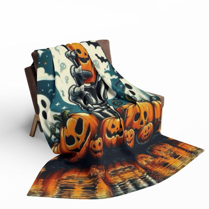 Decorative and Warm Halloween Spooky Arctic Fleece Blanket draped over a chair, revealing its striking artwork of pumpkins and skeletons, ideal for creating a cozy and stylish Halloween atmosphere.