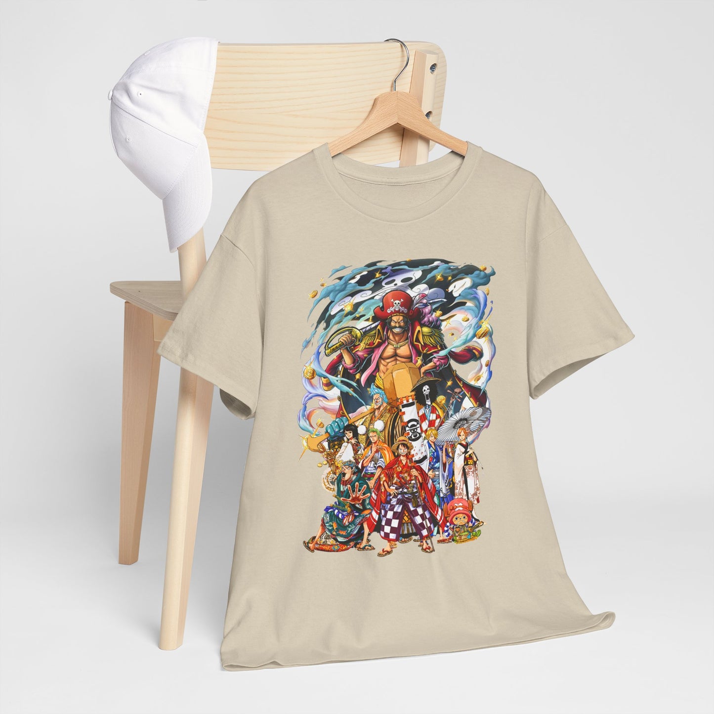 Stylish beige men's T-shirt elegantly displayed on a wooden chair, adorned with a striking graphic of a pirate and anime characters, ideal for casual wear.
