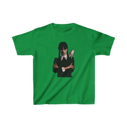 Luxury unisex graphic tee showcasing Wednesday Addams alongside Thing, designed for kids. Captivating green background with stylish artwork.