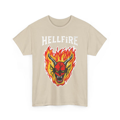 Chic beige Hellfire Club T-shirt displayed with a dynamic red and yellow fire-themed graphic and a prominent demon face, combining retro charm with modern luxury.