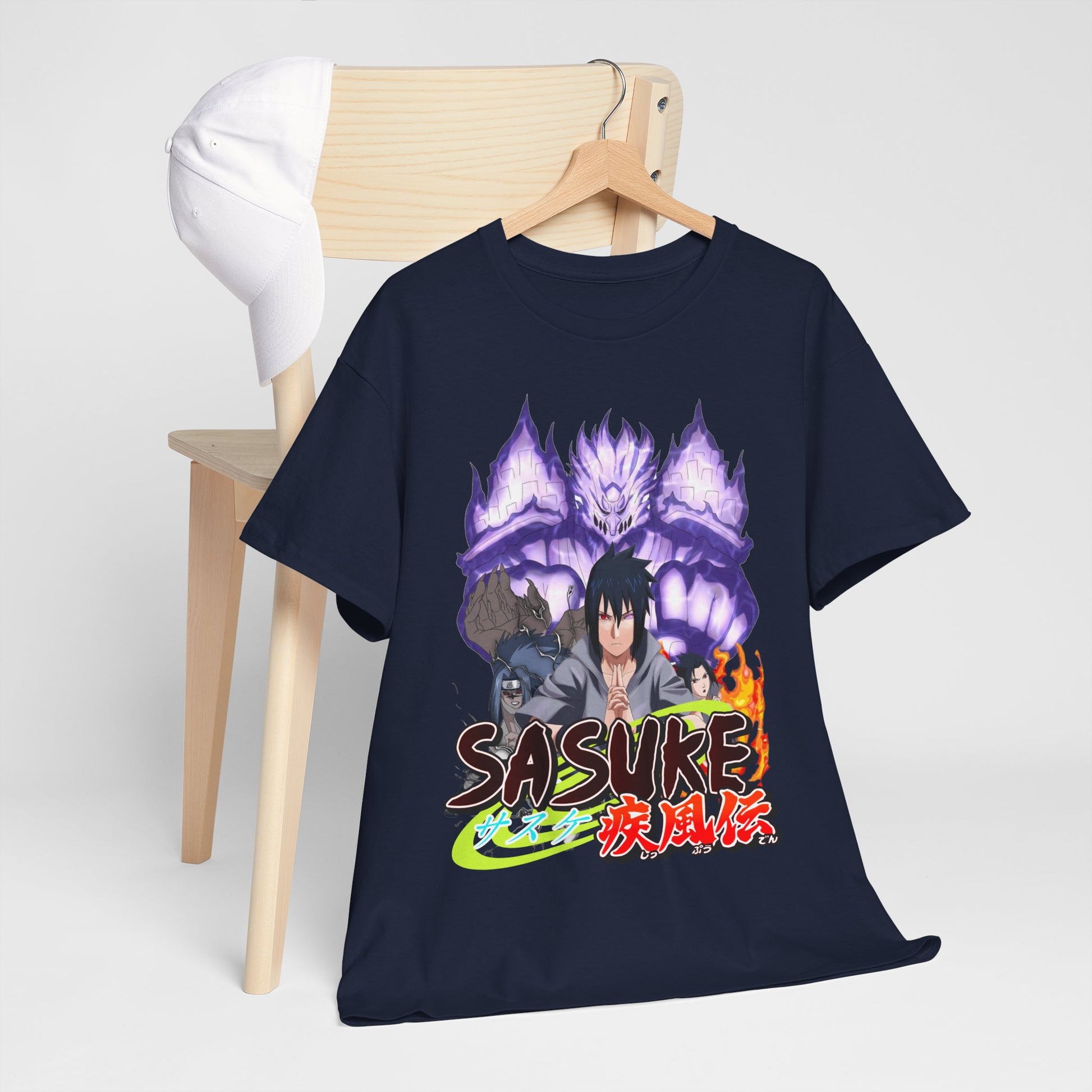 Stylish Sasuke Graphic Tee draped over a wooden chair, paired with a chic cap, radiating sophisticated anime fashion.