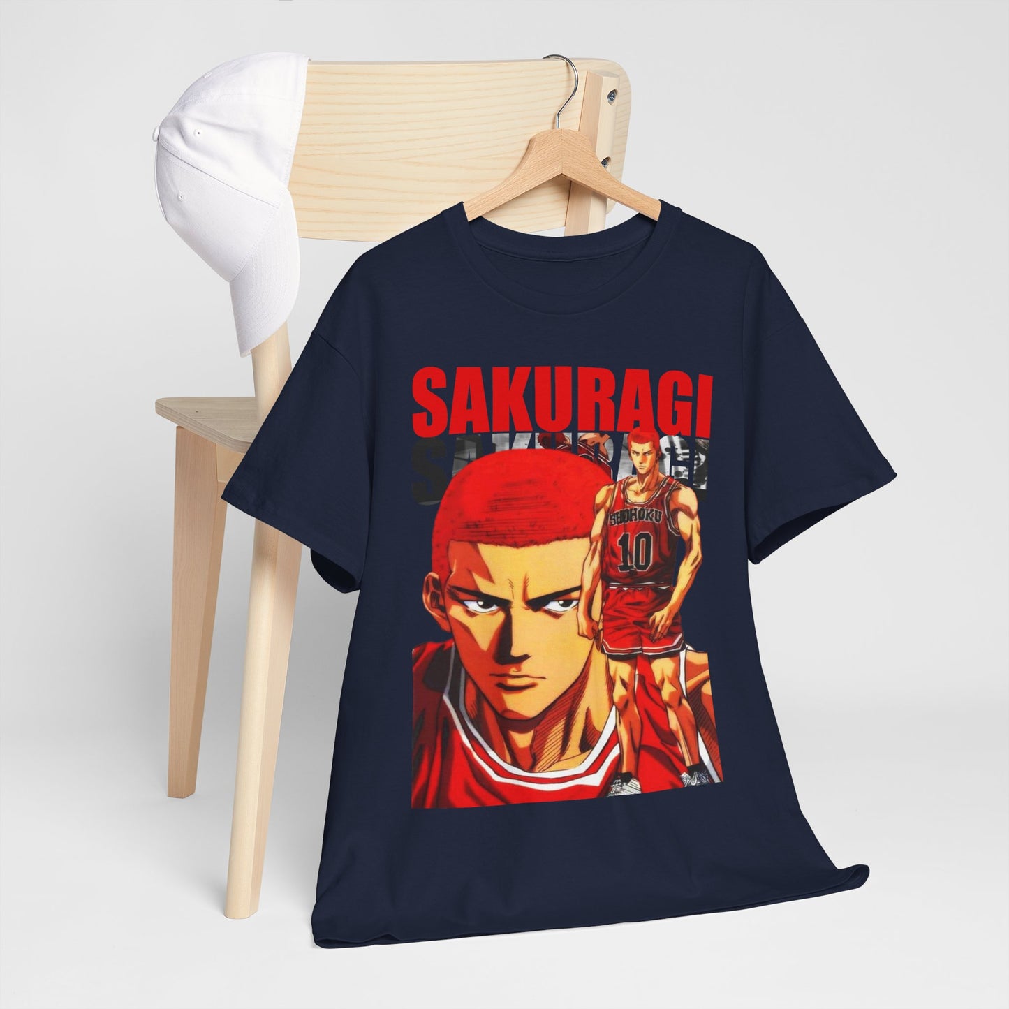 Luxury anime t-shirt featuring a bold design of Sakuragi from Slam Dunk, elegantly displayed on a stylish wooden hanger against a minimalist backdrop.