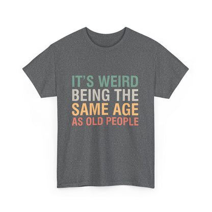 Chic urban unisex cotton T-shirt featuring a playful graphic design that reads 'It’s Weird Being The Same Age As Old People', perfect for expressing individuality.