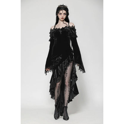 Luxurious close-up of velvet fabric in a gothic off-shoulder mermaid dress highlighting intricate ruffle embellishments.