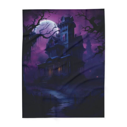 Luxurious Decorative and Warm Halloween Spooky Arctic Fleece Blanket featuring a haunting mansion silhouette, perfect for creating an enchanting atmosphere this season.