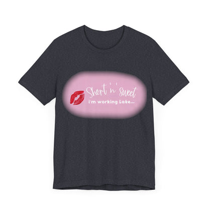 Front view of Sabrina Carpenter Inspired Unisex Short Sleeve Tee featuring a playful lipstick design and a stylish slogan, perfect for fans and fashion lovers.