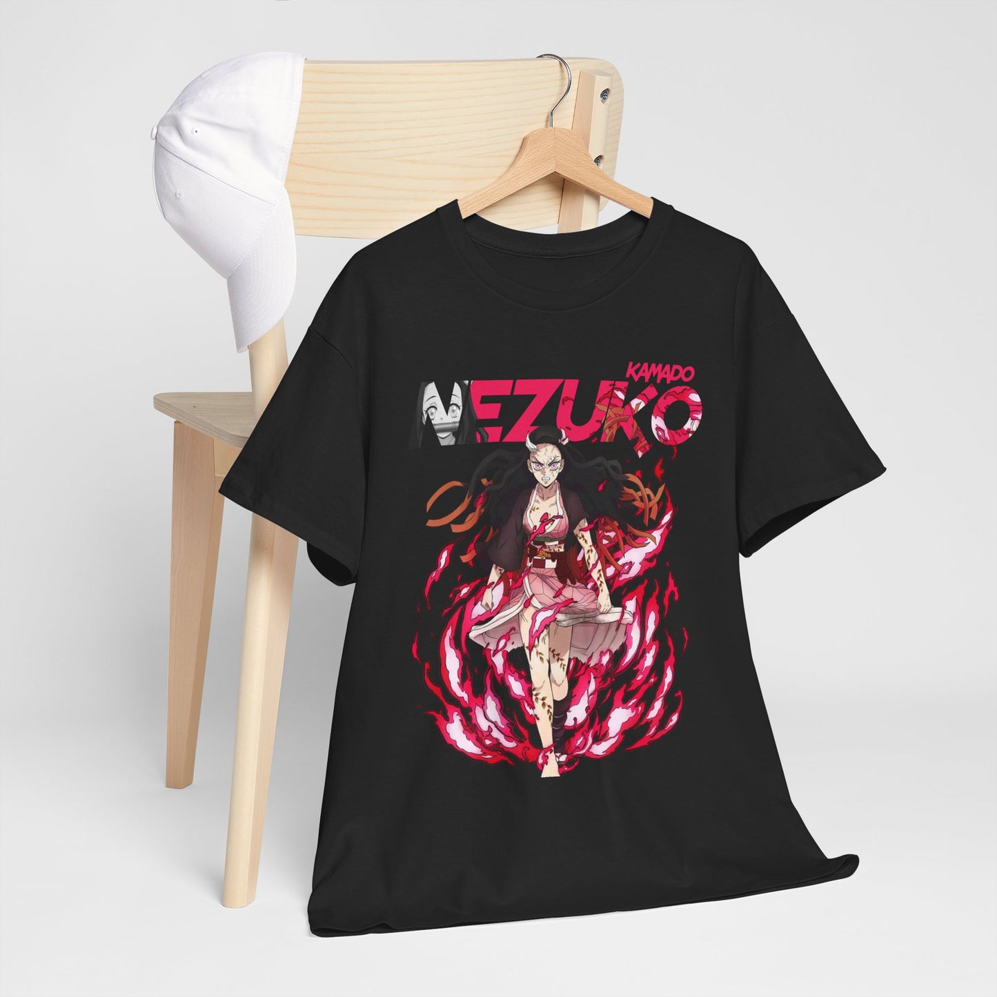 Sophisticated black T-shirt adorned with Nezuko Kamado design, gracefully draped over a chair, perfect for complementing chic casual looks.