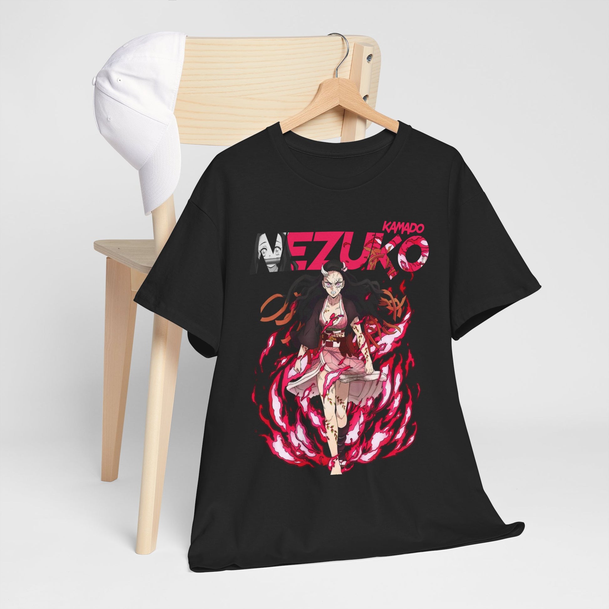 Sophisticated black T-shirt adorned with Nezuko Kamado design, gracefully draped over a chair, perfect for complementing chic casual looks.