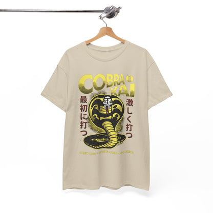 Stylishly hanging Cobra Kai graphic T-shirt, adorned with the striking Cobra emblem, conveying a sense of nostalgia and trendiness for dedicated fans.