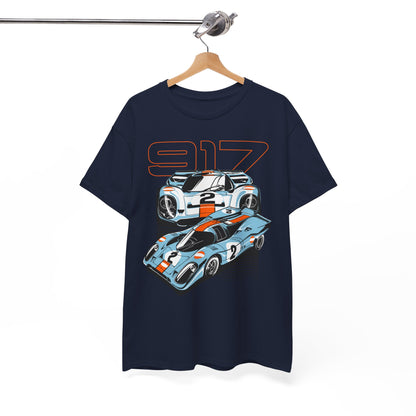 Navy blue t-shirt featuring Porsche 917 graphic design, artistically hanging, showcasing luxury fashion for motorsport aficionados.