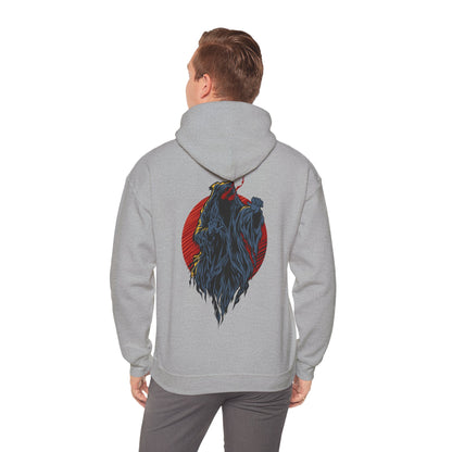 Man wearing a captivating grey hoodie featuring a bold demon design against a fiery red circle, perfect for making a statement.