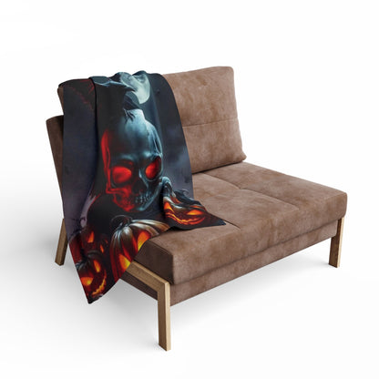 Decorative and Warm Halloween Spooky Arctic Fleece Blanket draped over a chic sofa, featuring a captivating Halloween skull design and vibrant pumpkins.