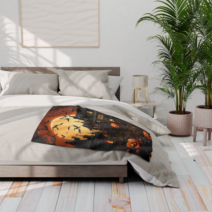 Elegant Decorative and Warm Halloween Spooky Arctic Fleece Blanket draped on a plush bed, showcasing intricate Halloween-themed artwork of bats and pumpkins.