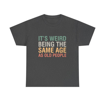 Luxurious cotton graphic T-shirt featuring the phrase 'It's Weird Being The Same Age As Old People' in elegant typography, perfect for casual sophistication.