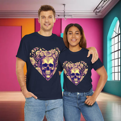 Fashionable pair in Skulls and Roses Cotton Tee, a unisex graphic shirt adorned with an intricate skull and floral motif, posed in an artistic, brightly coloured room.