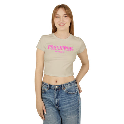 Front view of a fashionable cropped t-shirt in cream, designed for women, featuring playful typography with the words 'Pornstar' and 'It's A Secret', ideal for a trendy, casual look.