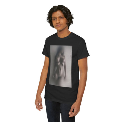 Chic individual wearing an exquisite black t-shirt with a blurred human figure graphic, exuding modern elegance and artistry.