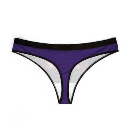 Chic women's thong displaying a humorous message 'MY SAFE WORD IS HARDER', designed in striking purple and black, epitomising flirtatious elegance.
