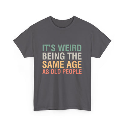 Luxurious graphic T-shirt featuring the phrase 'It’s Weird Being The Same Age As Old People' in stylish typography on a premium cotton fabric.