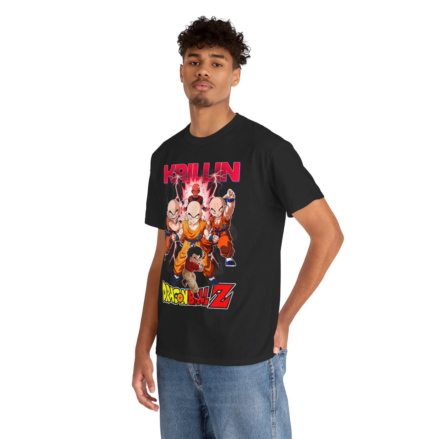 Fashionable male model elegantly wearing a black Dragon Ball Z T-shirt, featuring Krillin and vibrant energy designs, styled with casual denim, exuding a trendy urban vibe.