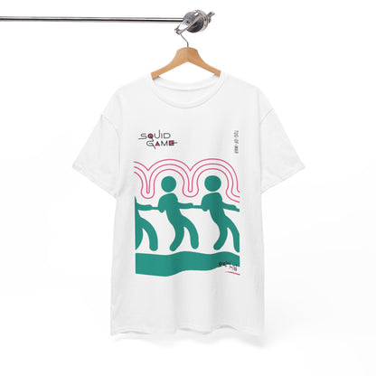 Luxurious graphic T-shirt featuring a unique Squid Game design, showcasing playful figures in a tug-of-war motif, displayed elegantly on a wooden hanger.